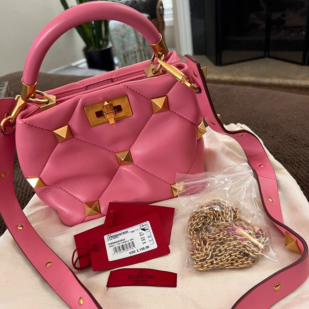 Authentic Valentino Garavani carried one time. Have dust bag and all the tags.